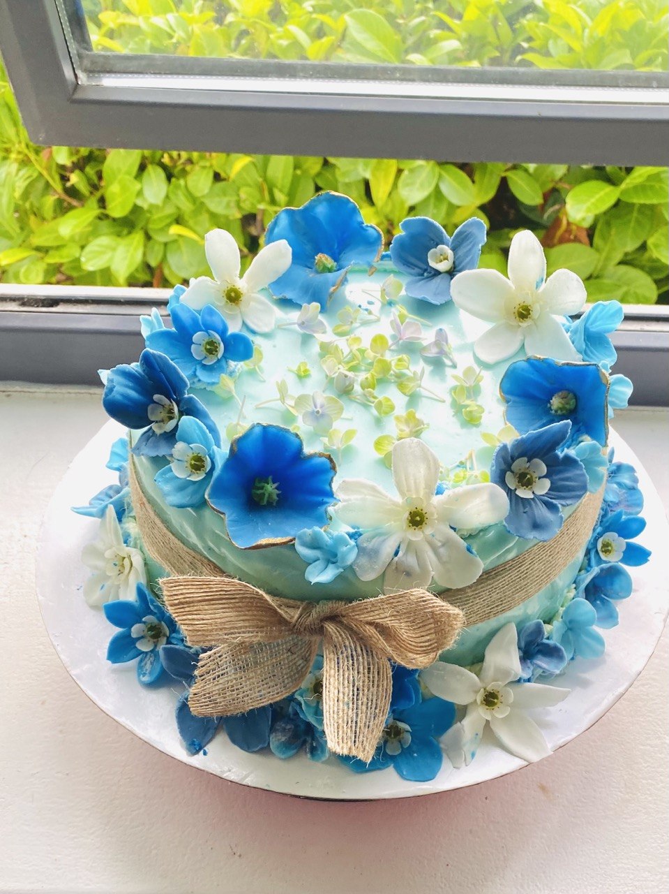 Blue and white floral birthday cake
